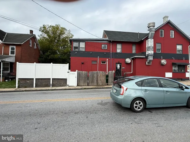 a car parked in front of a building