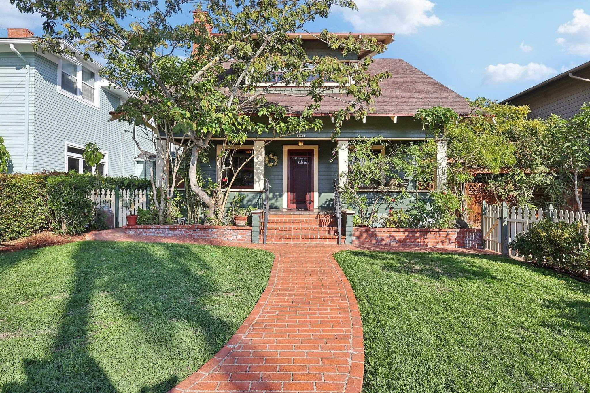 3785 Albatross Street San Diego, CA 92103 - Photo 1 of 73 a front view of a house with a yard and fountain