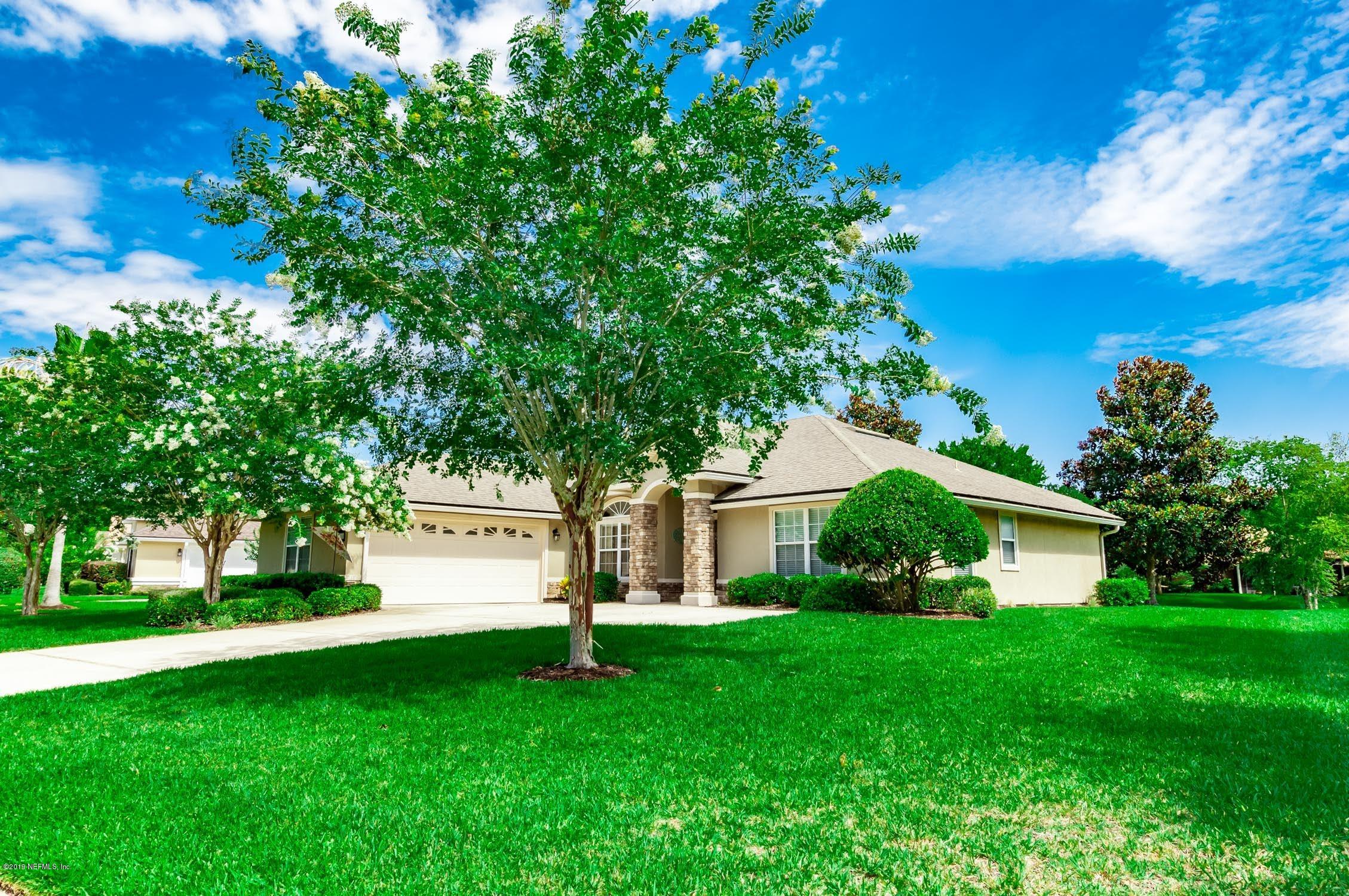 1152 Sandlake Road St. Augustine, FL 32092 - Photo 1 of 46 a front view of a house with garden