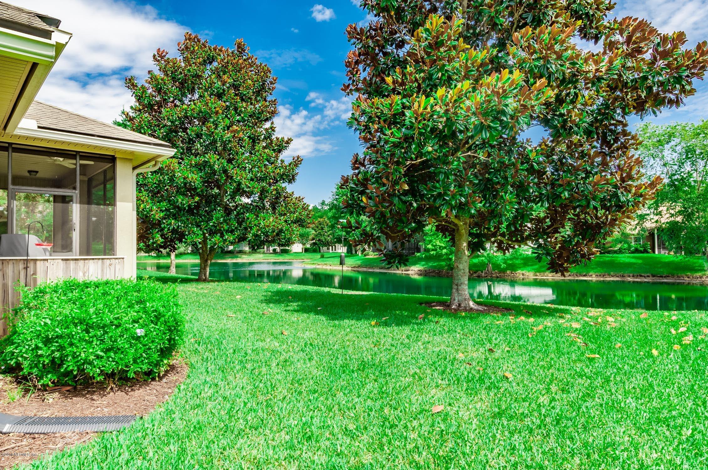 1152 Sandlake Road St. Augustine, FL 32092 - Photo 25 of 46 a view of a park that has a large tree