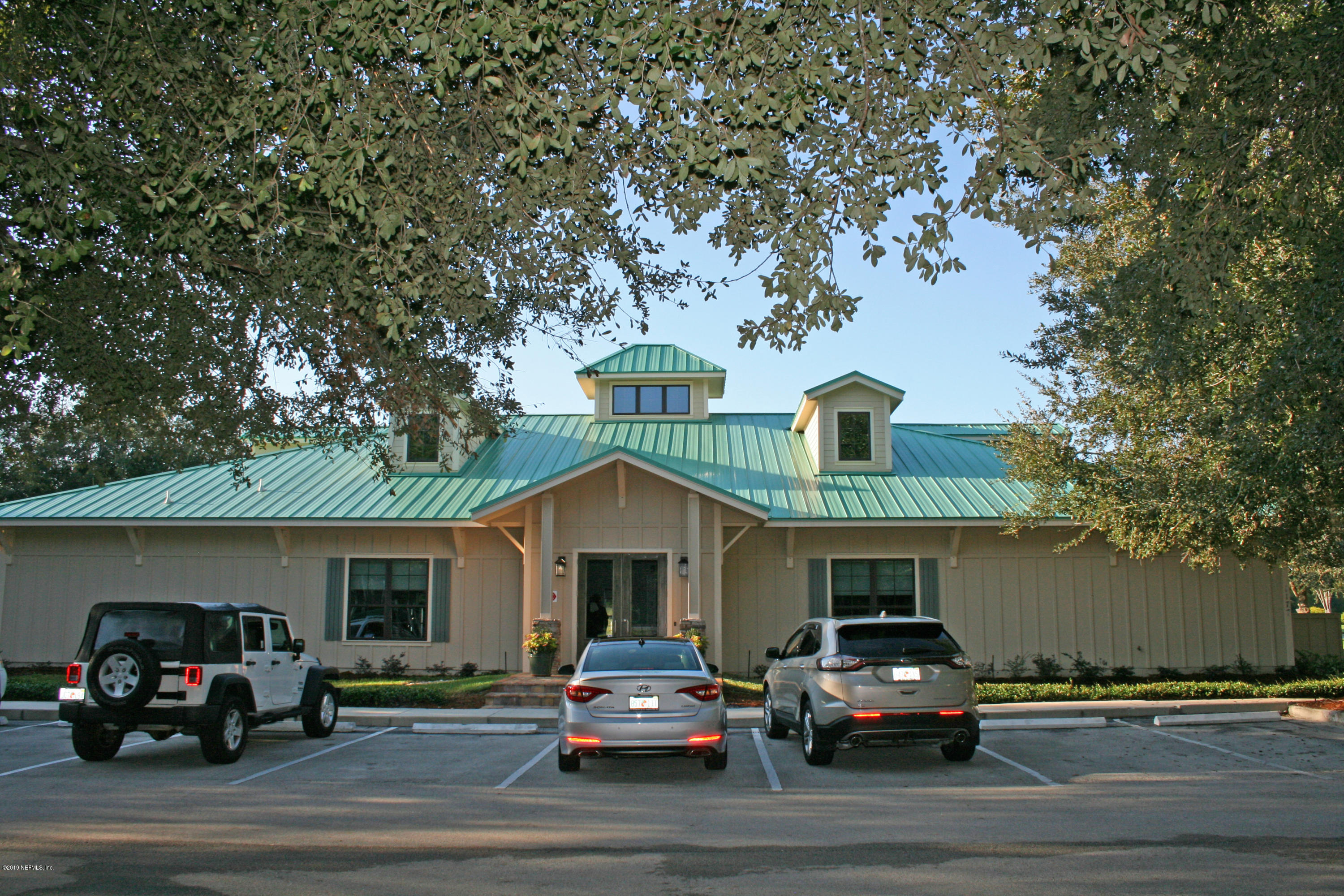 1152 Sandlake Road St. Augustine, FL 32092 - Photo 42 of 46 a car parked in front of a house