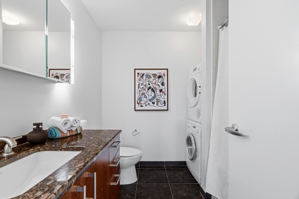 40 Fay Street, Unit 406 Boston, MA 02118 - Photo 12 of 19 a bath room with a sink and a toilet