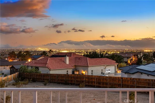a view of a house with a swimming pool