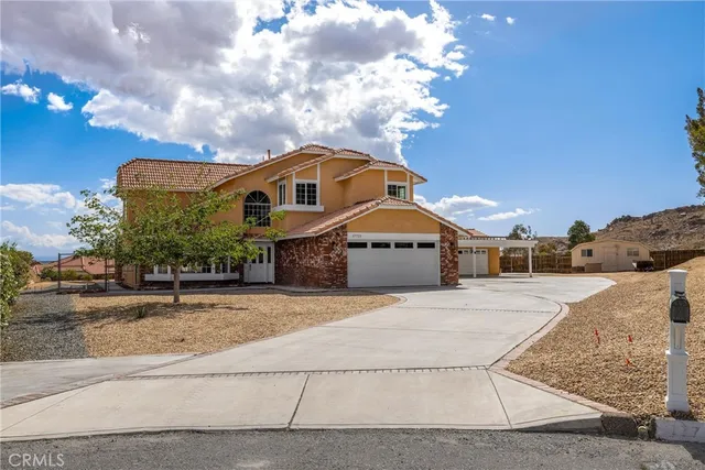 a house view with a outdoor space