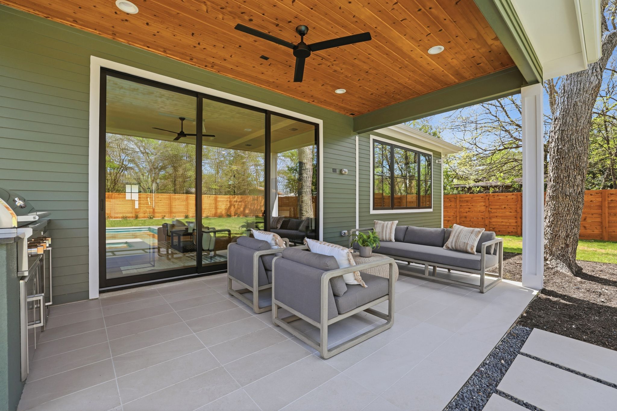 4500 Jinx Avenue Austin, TX 78745 - Photo 36 of 40 Fenced backyard featuring an outdoor hangout area, a patio, and ceiling fan