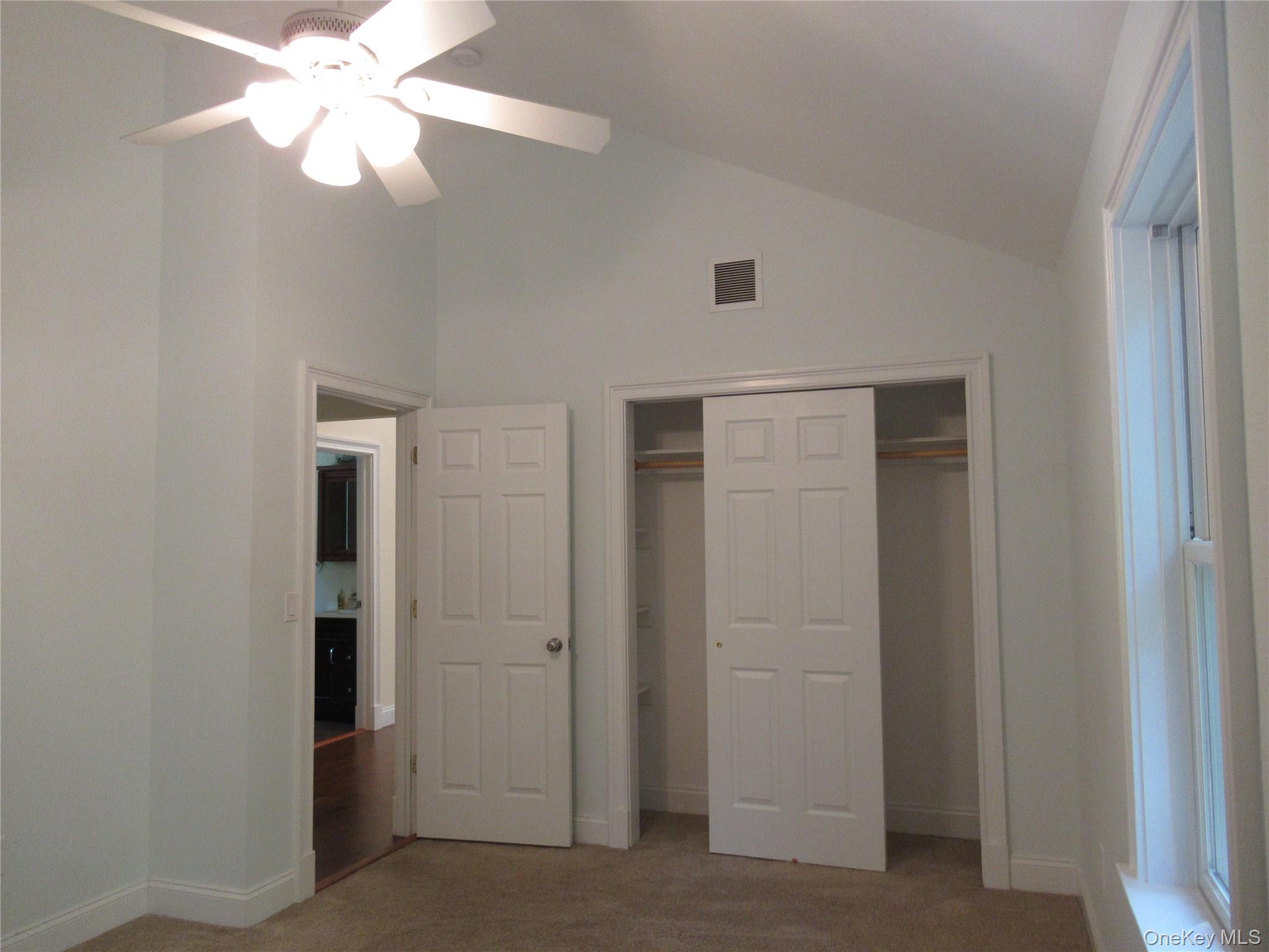 101 Bundy Hill Road Holmes, NY 12531 - Photo 21 of 28 an empty room with closet and a ceiling fan