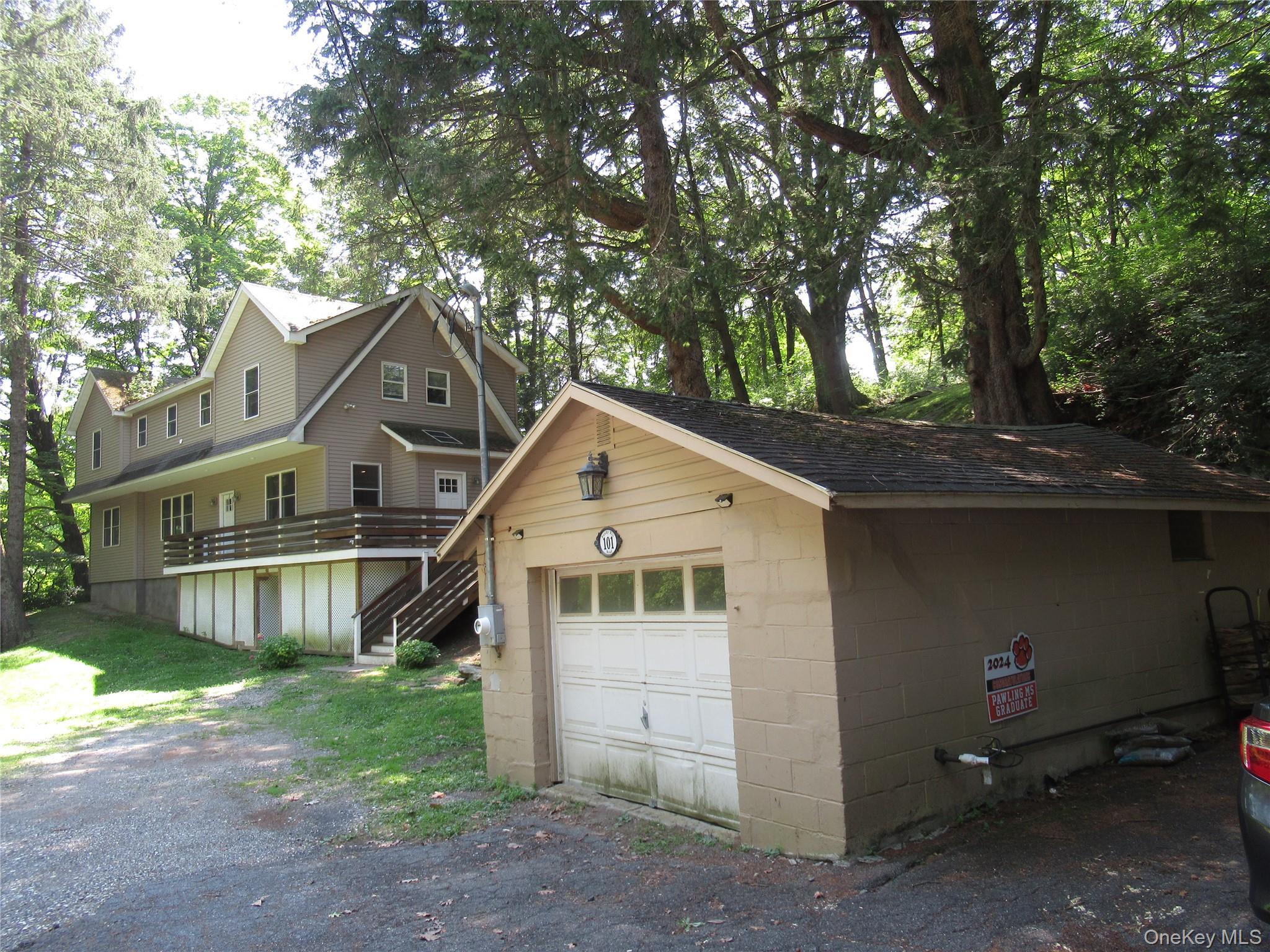 101 Bundy Hill Road Holmes, NY 12531 - Photo 28 of 28 a front view of a house with a garden