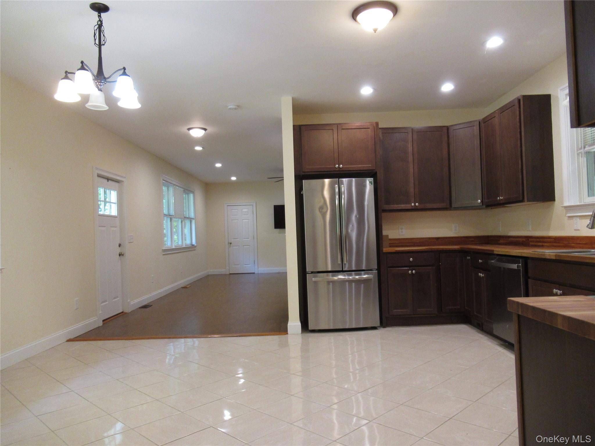101 Bundy Hill Road Holmes, NY 12531 - Photo 5 of 28 a kitchen with stainless steel appliances granite countertop a refrigerator and a sink