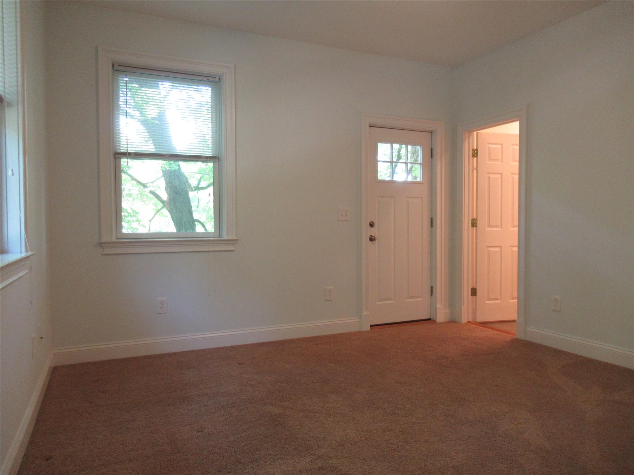 101 Bundy Hill Road Holmes, NY 12531 - Photo 9 of 28 an empty room with windows