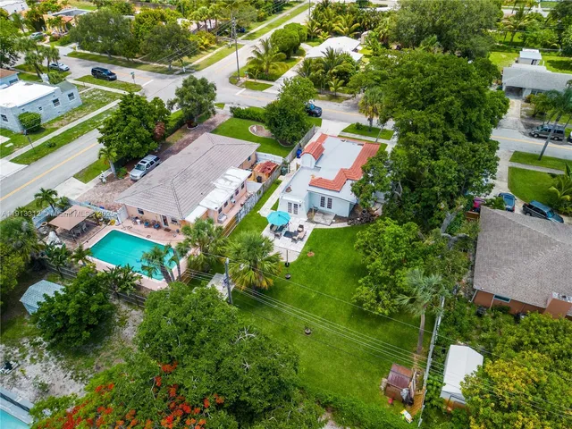 an aerial view of a house with a garden