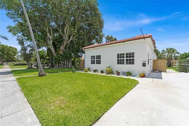 a view of a backyard with a garden