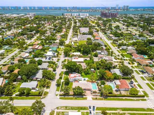 an aerial view of a house with a garden