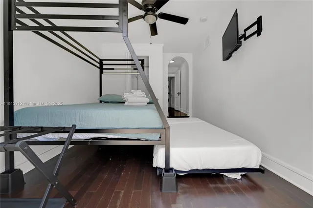 a room with table and wooden floor