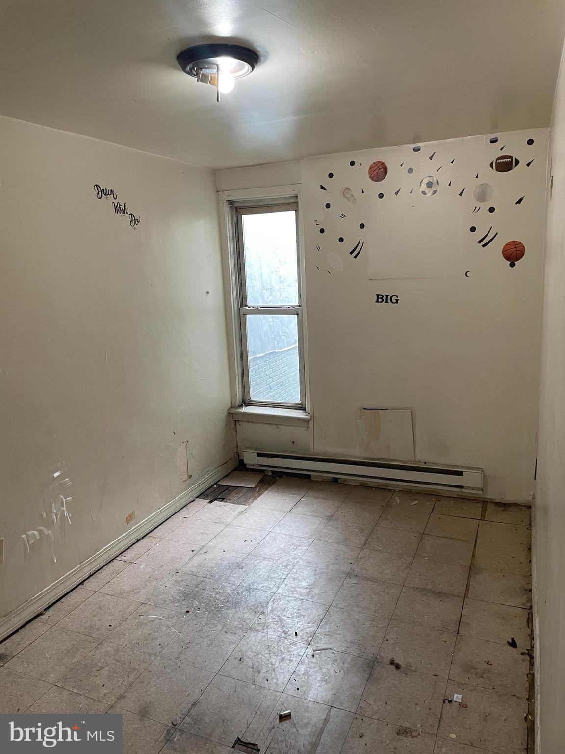 1822 Aiken Street Baltimore, MD 21213 - Photo 14 of 22 a view of a refrigerator in a kitchen