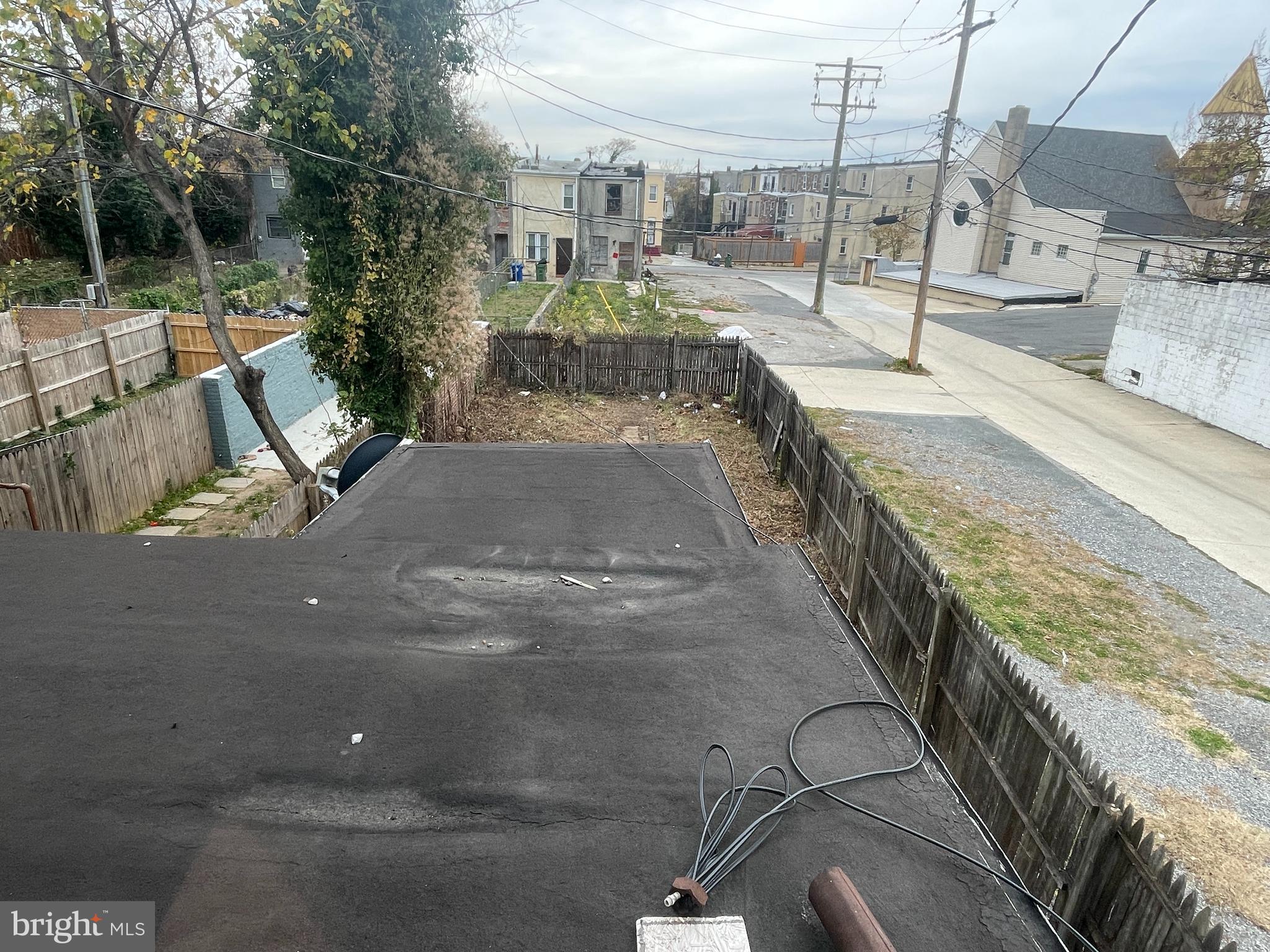 1822 Aiken Street Baltimore, MD 21213 - Photo 20 of 22 a view of a swimming pool with a patio