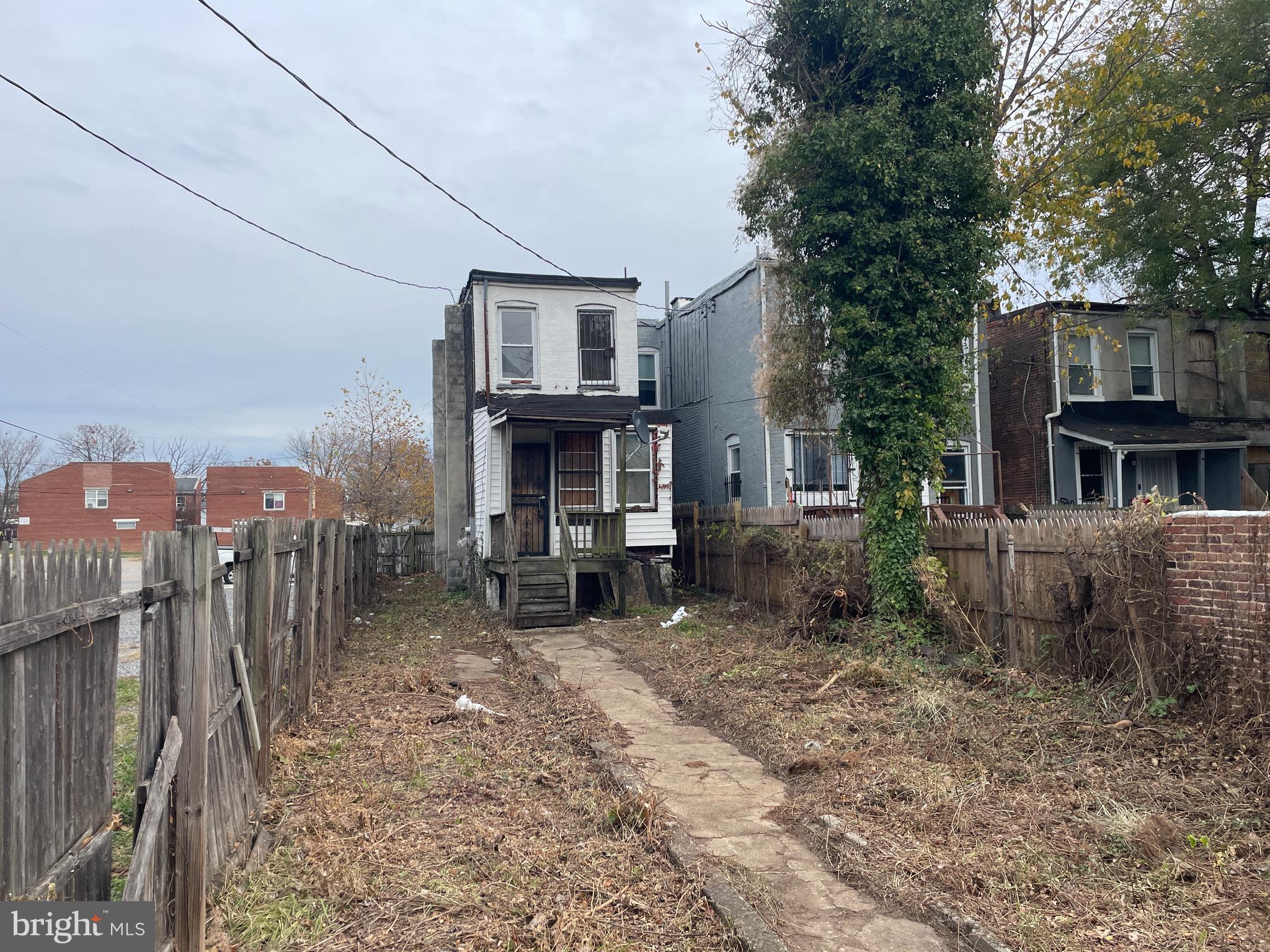 1822 Aiken Street Baltimore, MD 21213 - Photo 22 of 22 a view of a house with a back yard