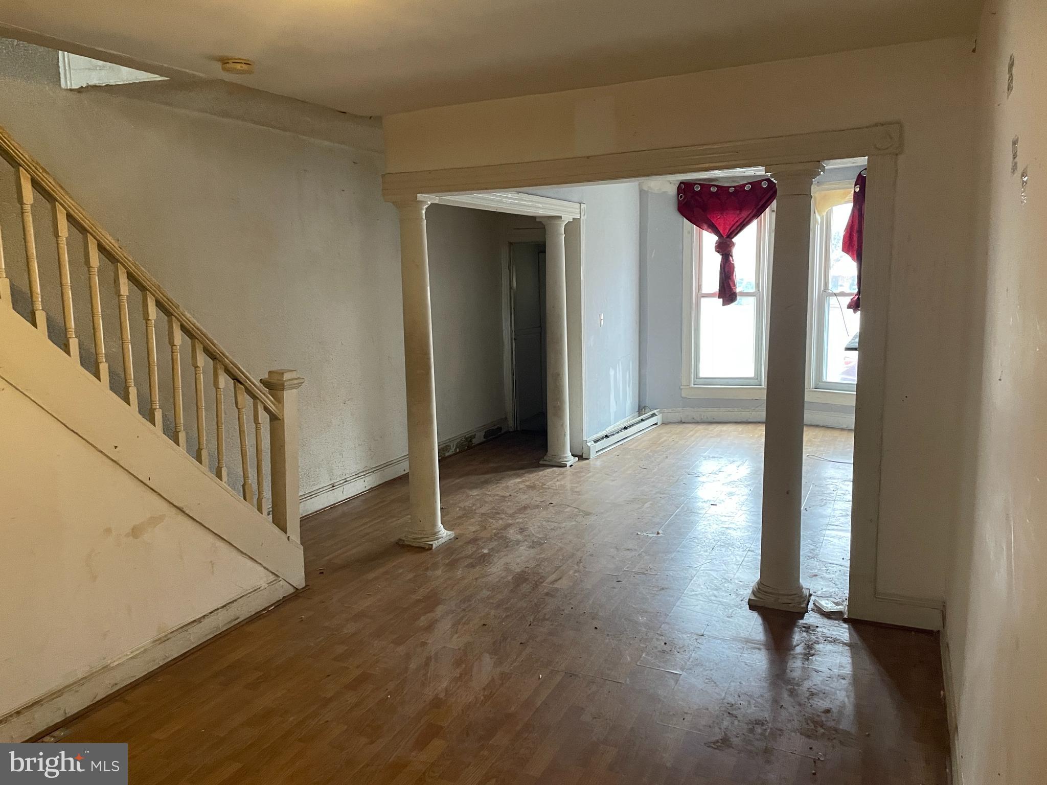 1822 Aiken Street Baltimore, MD 21213 - Photo 5 of 22 a view of a hallway with windows