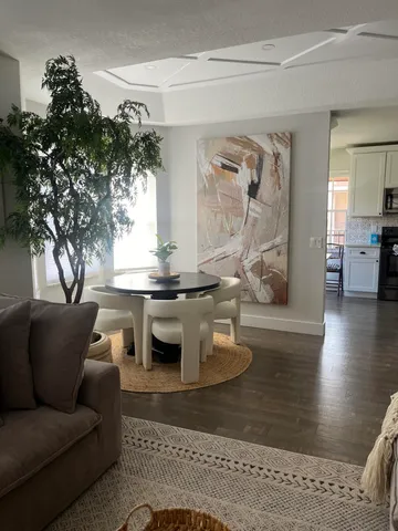 a living room with furniture and a table