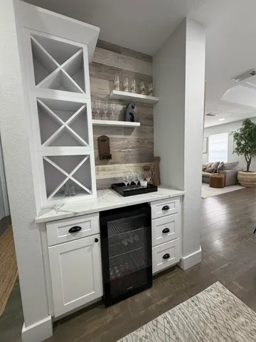 a kitchen with a stove and cabinets
