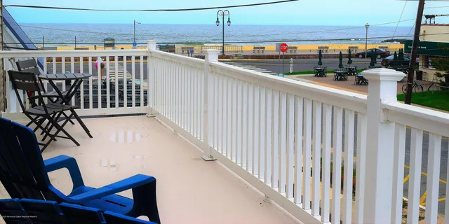 a view of a balcony with city view