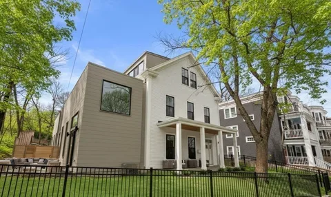 front view of a house with a garden