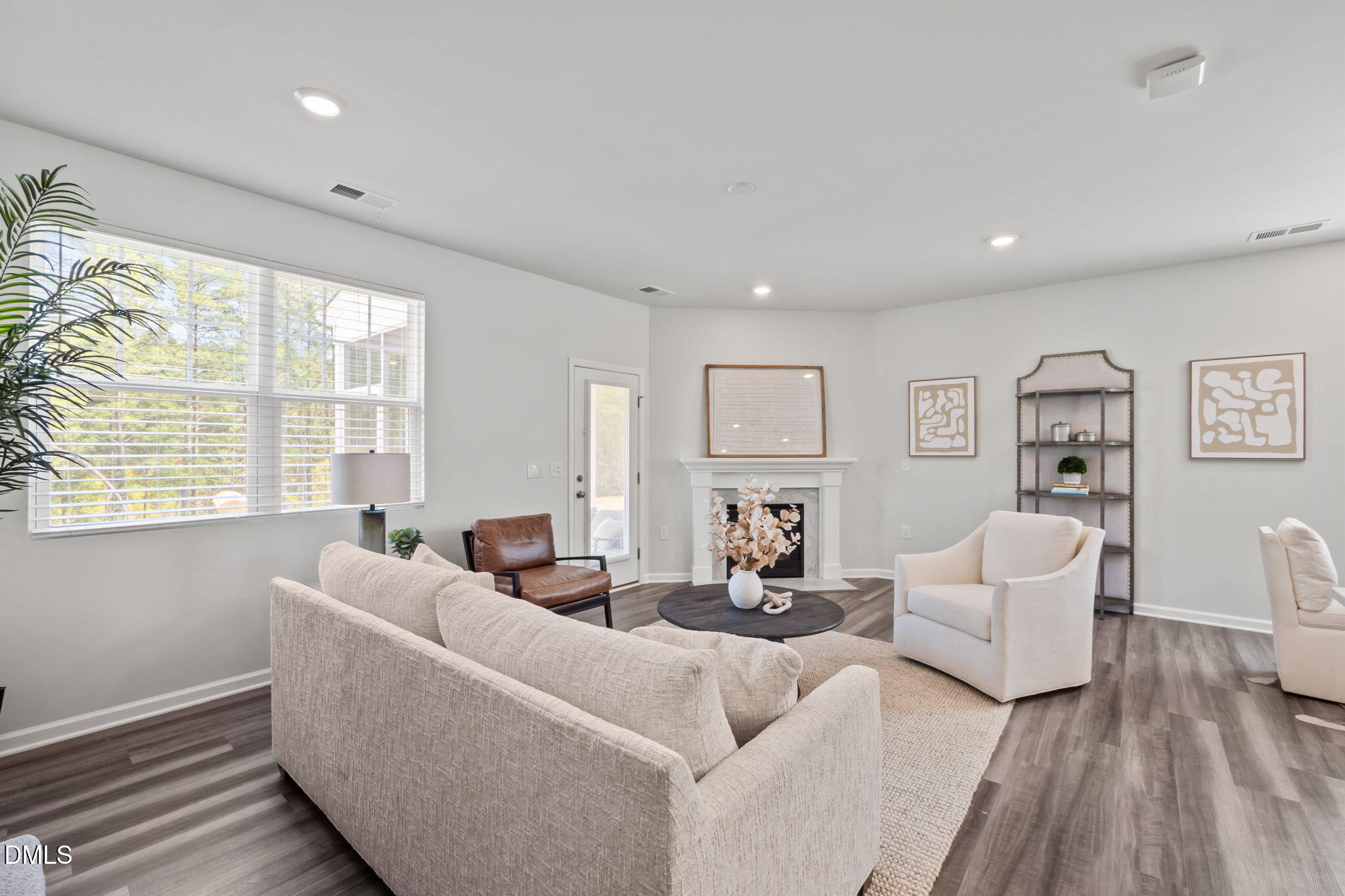 1050 Gentle Reed Drive Durham, NC 27703 - Photo 10 of 37 a living room with furniture and a large window