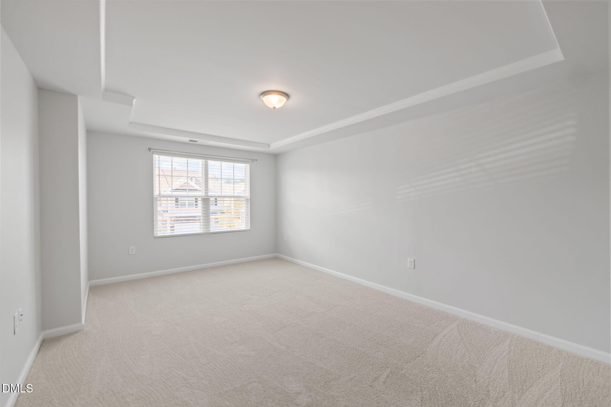 1050 Gentle Reed Drive Durham, NC 27703 - Photo 15 of 37 an empty room with a window