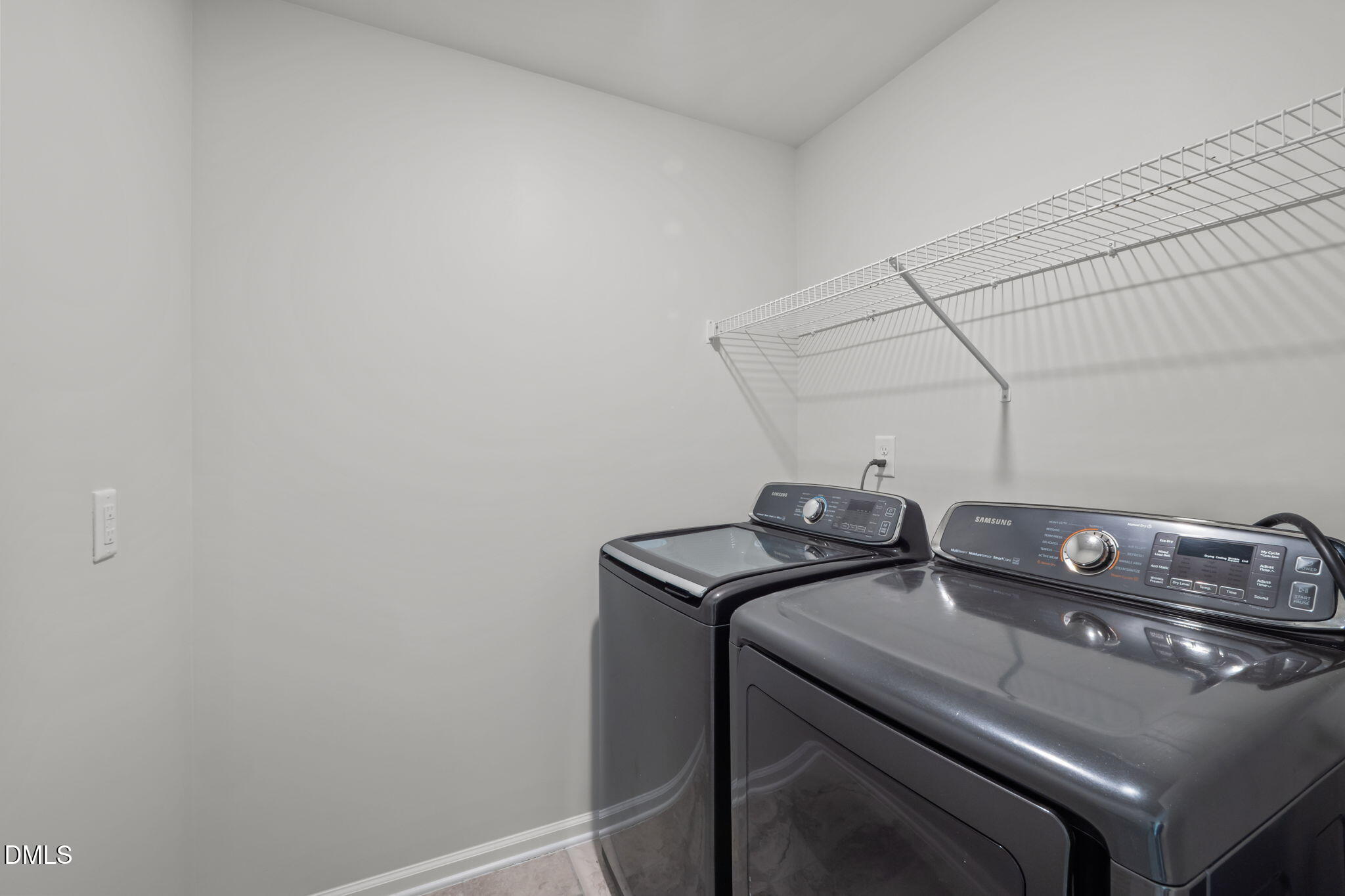 1050 Gentle Reed Drive Durham, NC 27703 - Photo 19 of 37 a utility room with dryer and washer
