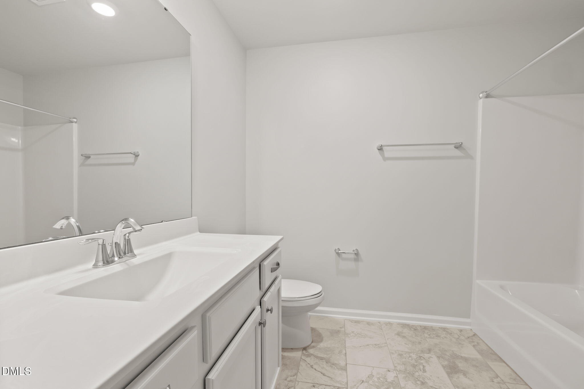 1050 Gentle Reed Drive Durham, NC 27703 - Photo 20 of 37 a bathroom with a sink toilet and vanity