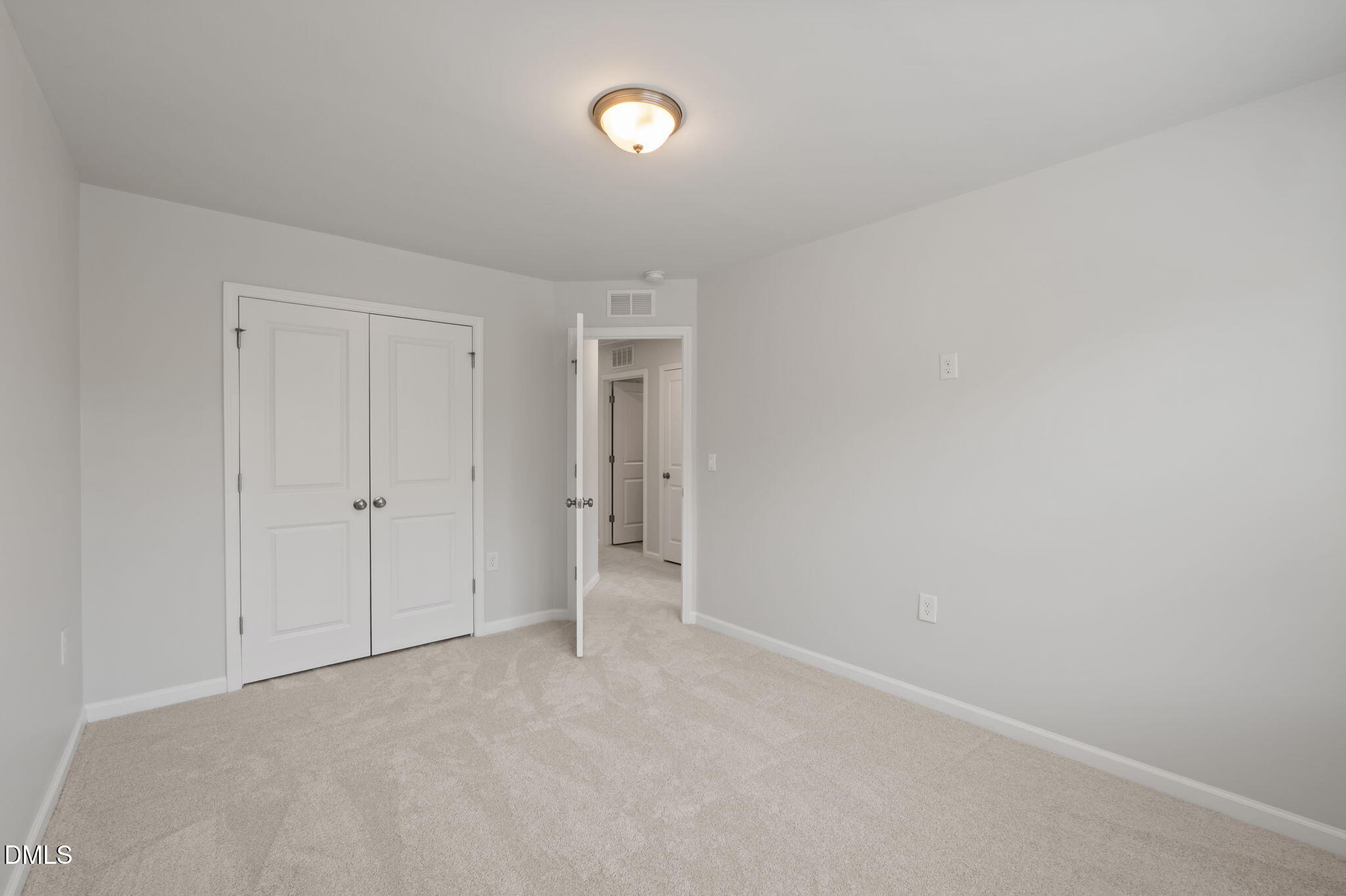 1050 Gentle Reed Drive Durham, NC 27703 - Photo 24 of 37 a view of an empty room and a ceiling fan