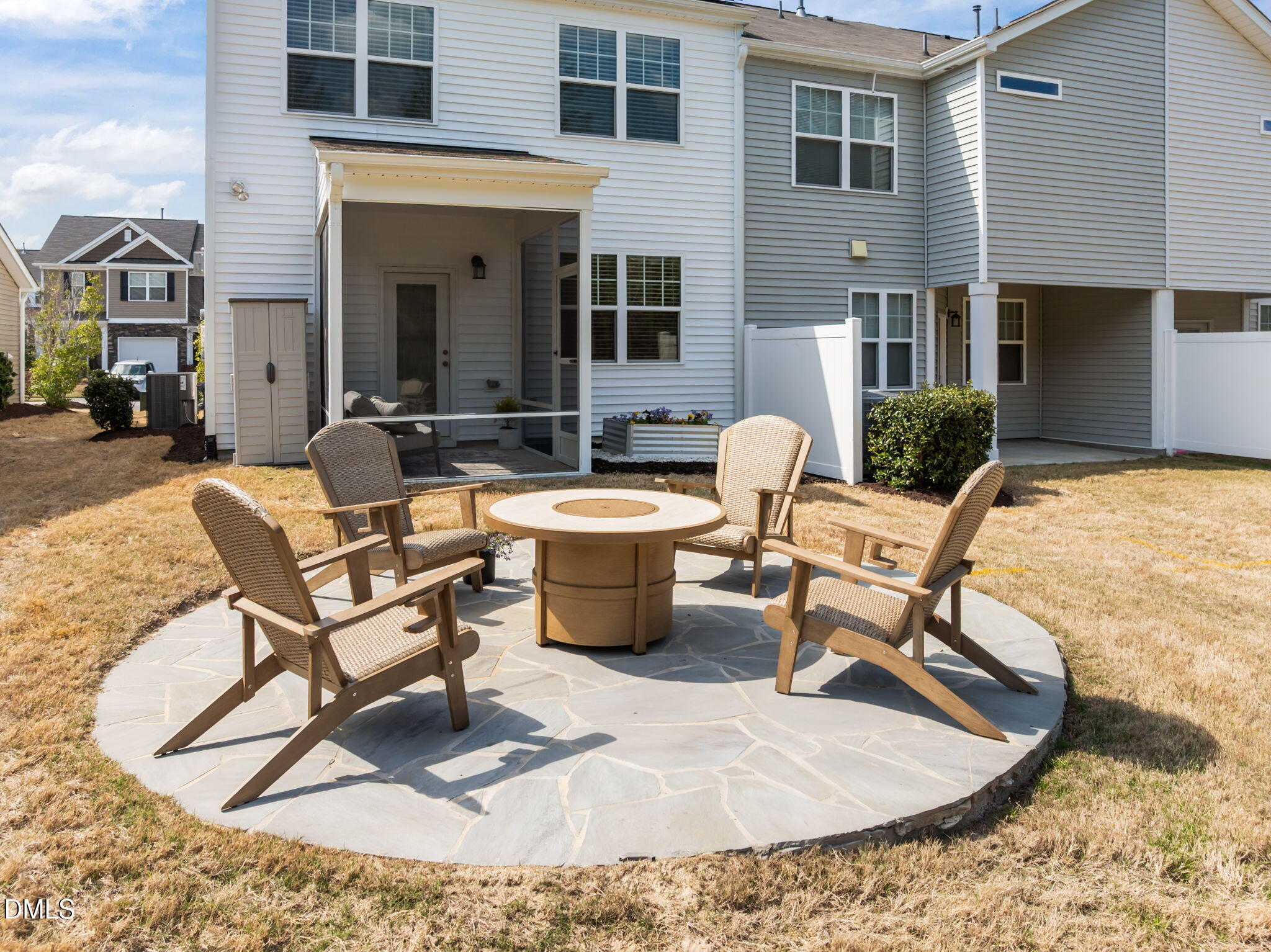 1050 Gentle Reed Drive Durham, NC 27703 - Photo 27 of 37 a building outdoor space with patio furniture