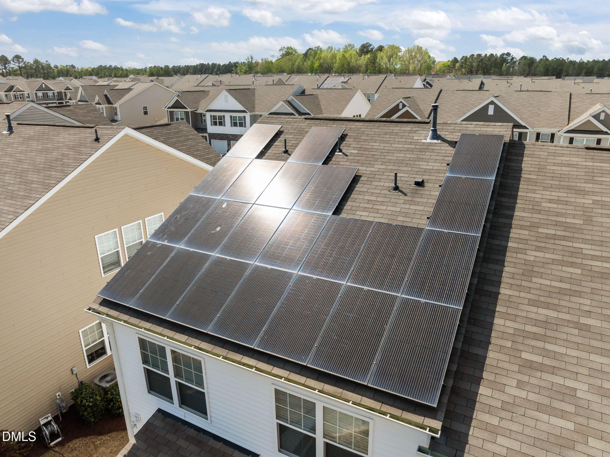 1050 Gentle Reed Drive Durham, NC 27703 - Photo 31 of 37 an aerial view of a house with a backyard