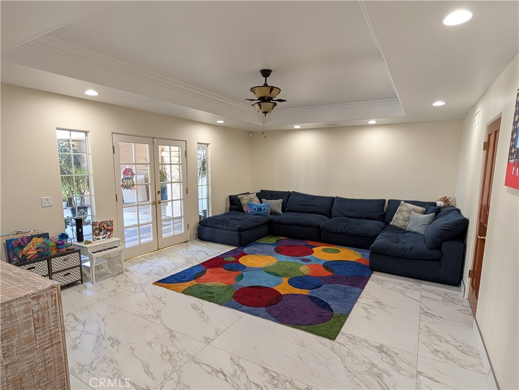 1719 Crystal Ridge Court Riverside, CA 92506 - Photo 20 of 60 a living room with furniture and wooden floor