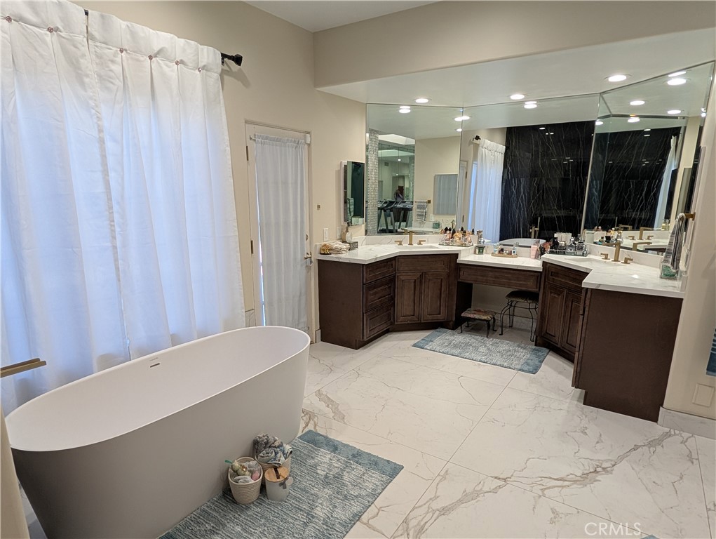 1719 Crystal Ridge Court Riverside, CA 92506 - Photo 31 of 60 a large kitchen with a sink and view of living room