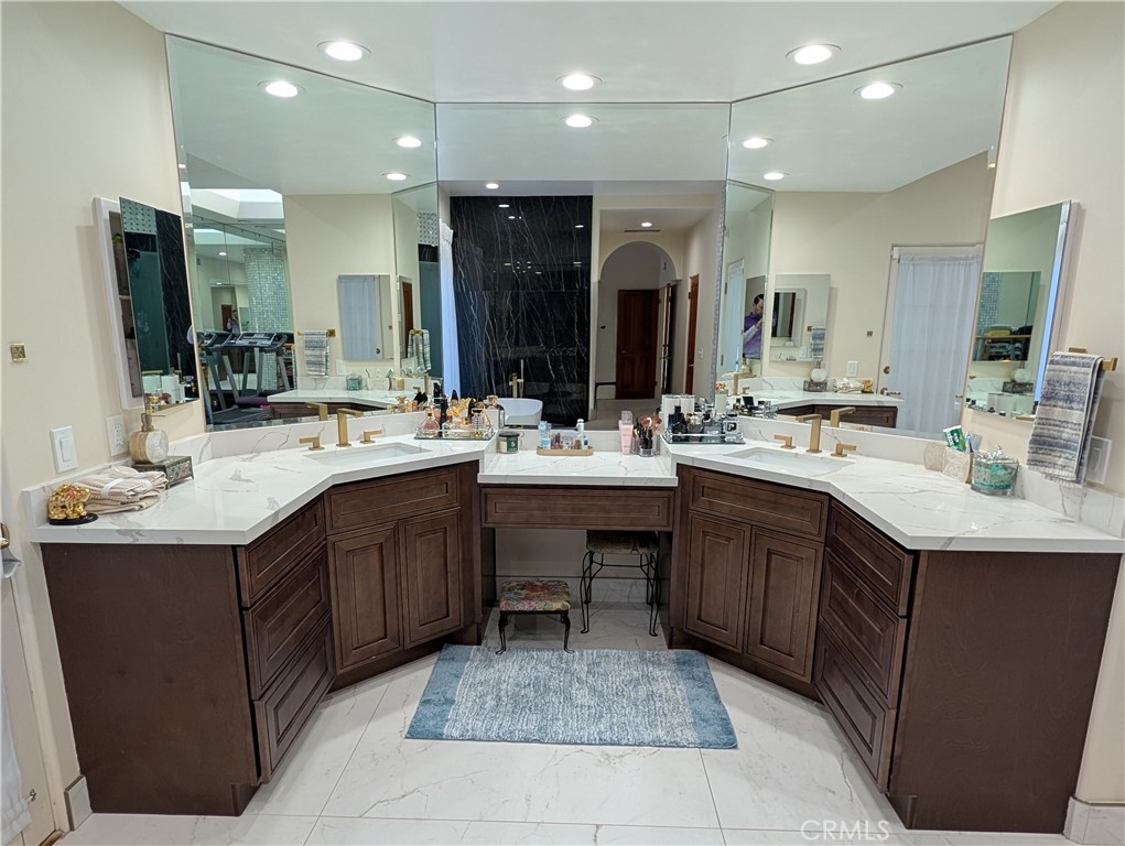 1719 Crystal Ridge Court Riverside, CA 92506 - Photo 32 of 60 a bathroom with a sink double vanity and a mirror