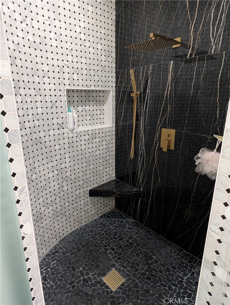 1719 Crystal Ridge Court Riverside, CA 92506 - Photo 33 of 60 a bathroom with a sink a toilet and shower