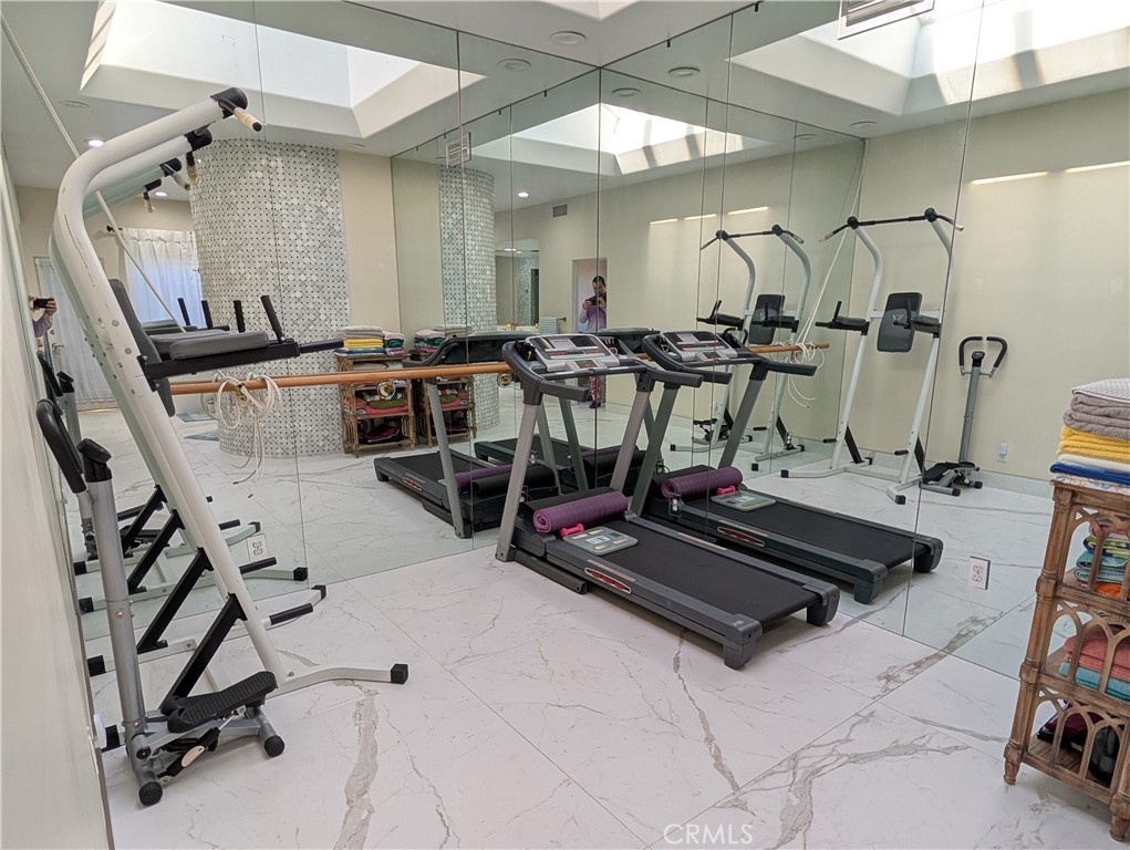 1719 Crystal Ridge Court Riverside, CA 92506 - Photo 34 of 60 a view of a room with gym equipment