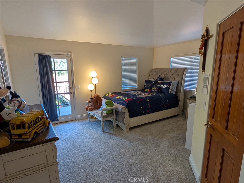 1719 Crystal Ridge Court Riverside, CA 92506 - Photo 35 of 60 a bedroom with a bed and a window