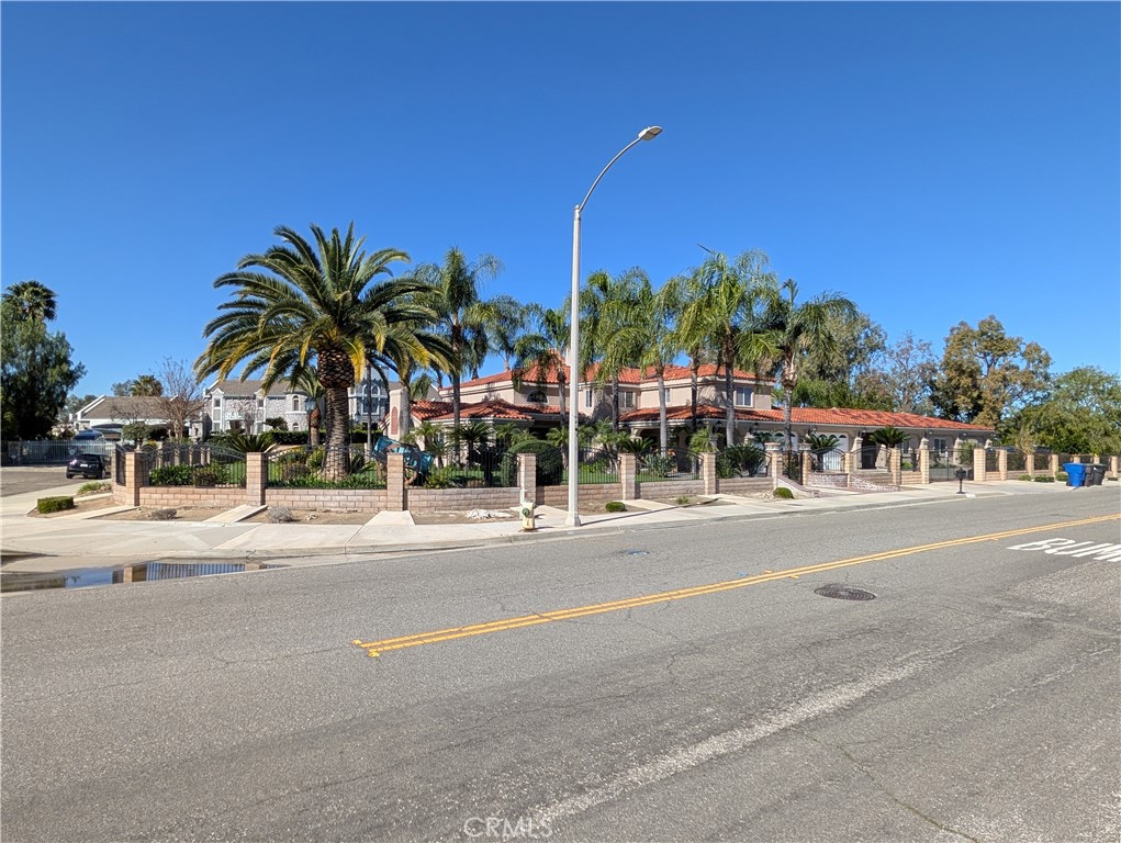 1719 Crystal Ridge Court Riverside, CA 92506 - Photo 4 of 60 front view of a house with a swimming pool