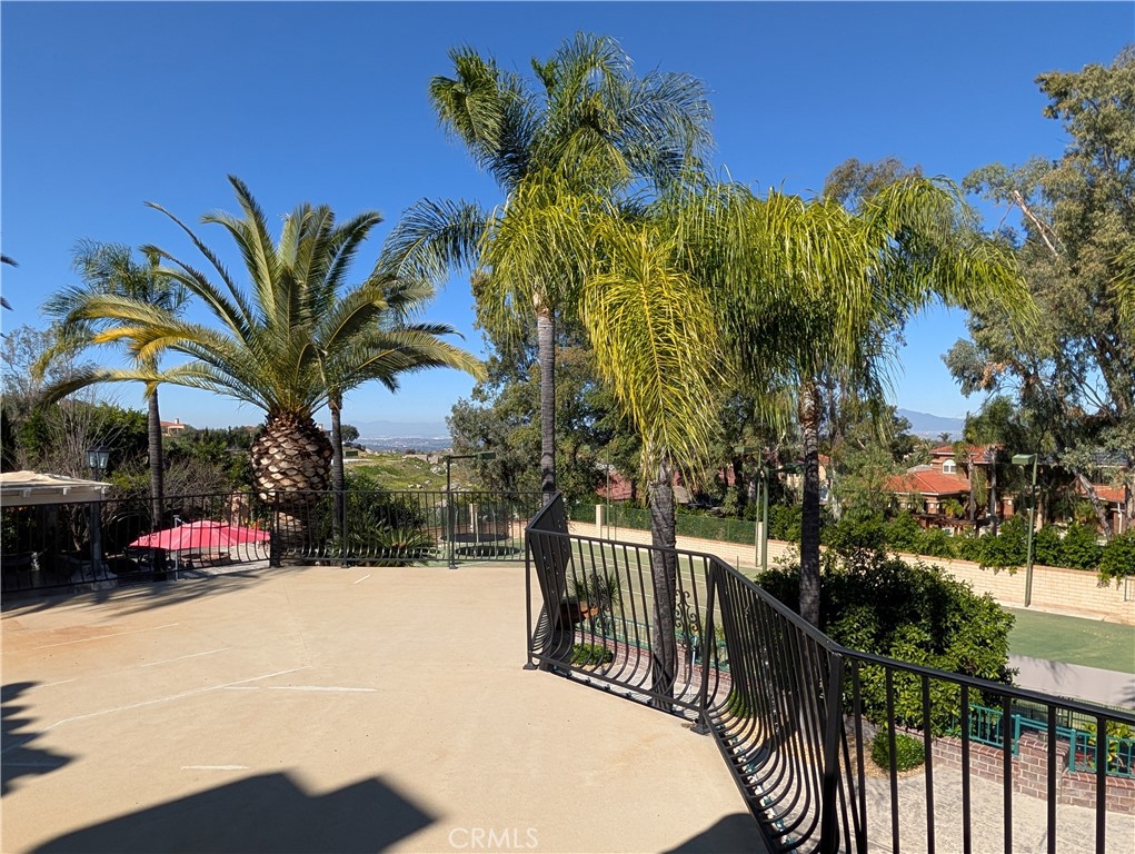 1719 Crystal Ridge Court Riverside, CA 92506 - Photo 48 of 60 a view of a house with a flower garden