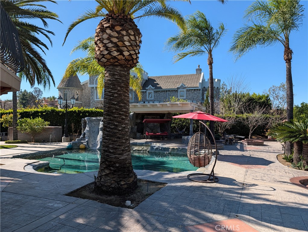 1719 Crystal Ridge Court Riverside, CA 92506 - Photo 53 of 60 a front view of a building with garden