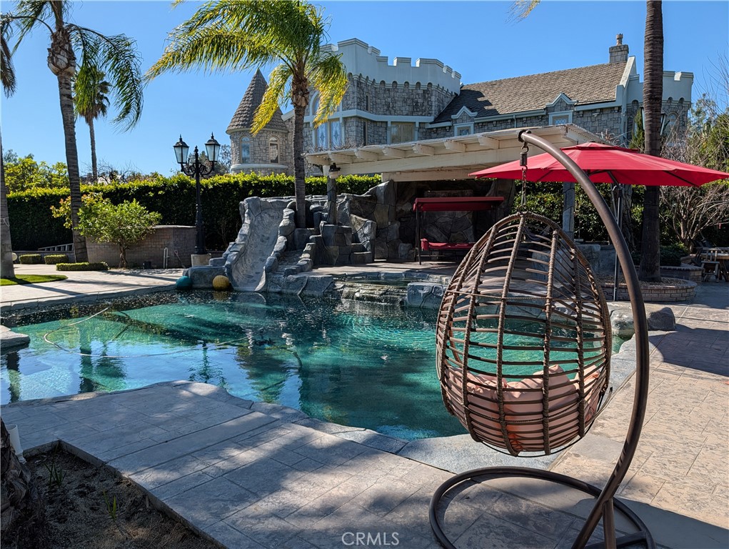 1719 Crystal Ridge Court Riverside, CA 92506 - Photo 55 of 60 an outdoor space with seating swimming pool and furniture