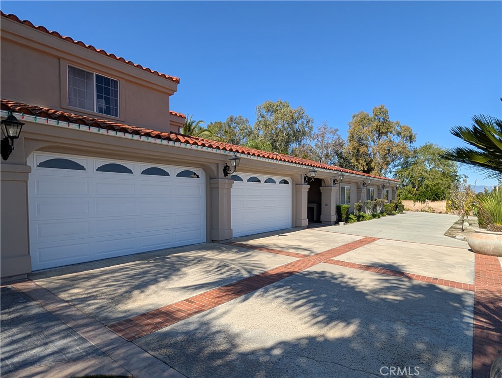 1719 Crystal Ridge Court Riverside, CA 92506 - Photo 58 of 60 a front view of a house with a yard
