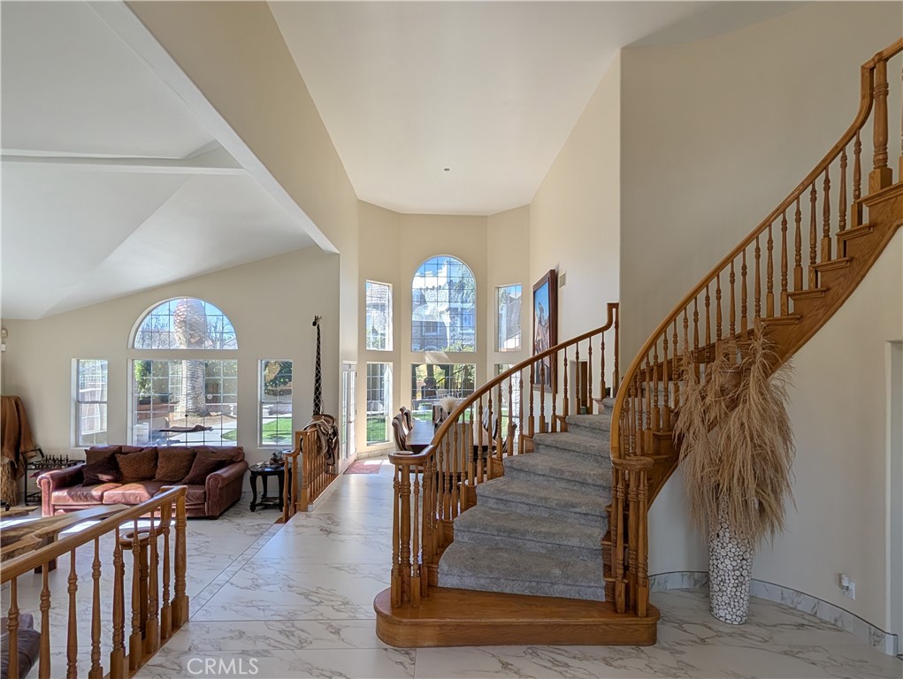 1719 Crystal Ridge Court Riverside, CA 92506 - Photo 10 of 60 a view of a livingroom with furniture stairs and a living room