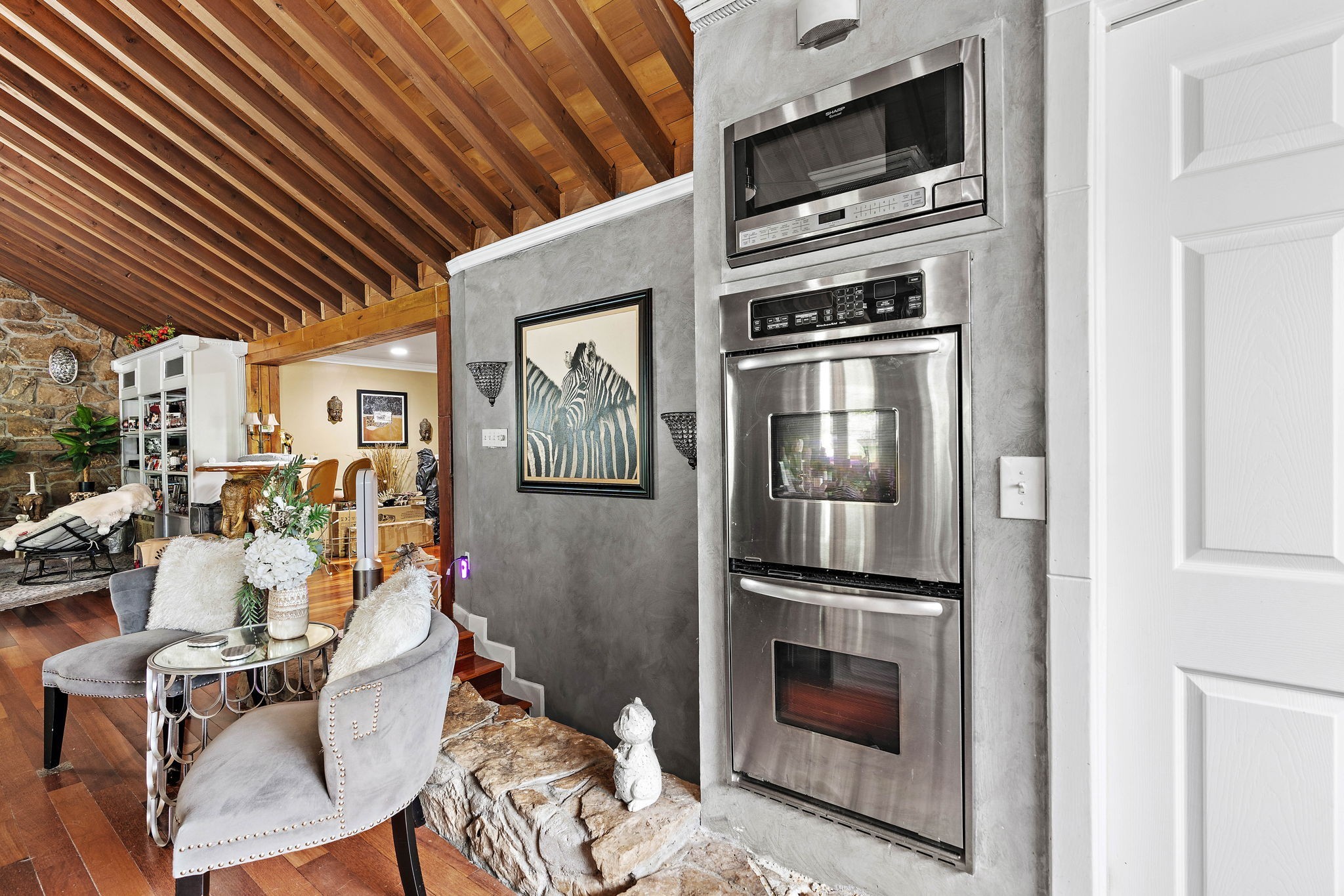 5521 Cane Ridge Road Antioch, TN 37013 - Photo 11 of 32 a kitchen with granite countertop stainless steel appliances and wooden cabinets