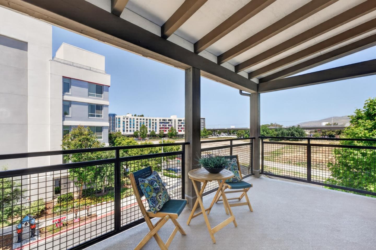 202 Market Street Milpitas, CA 95035 - Photo 24 of 30 a roof deck with table and chairs