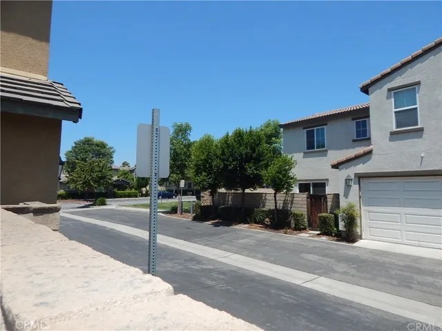 a view of a street with houses