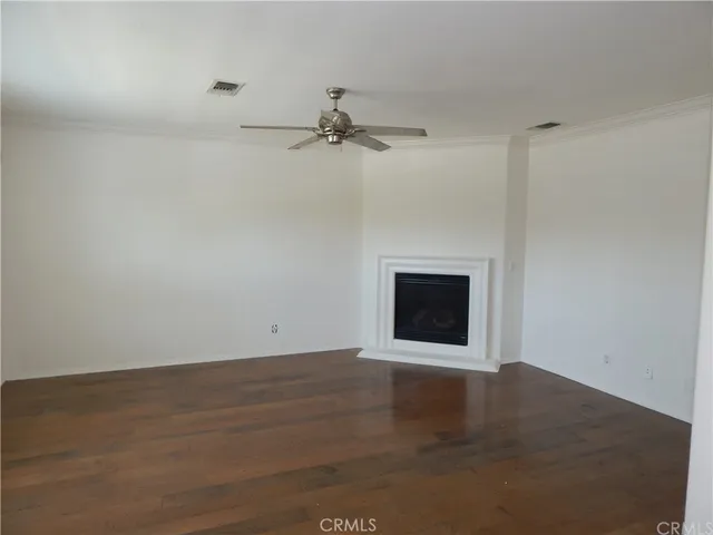 an empty room with a empty space and a window