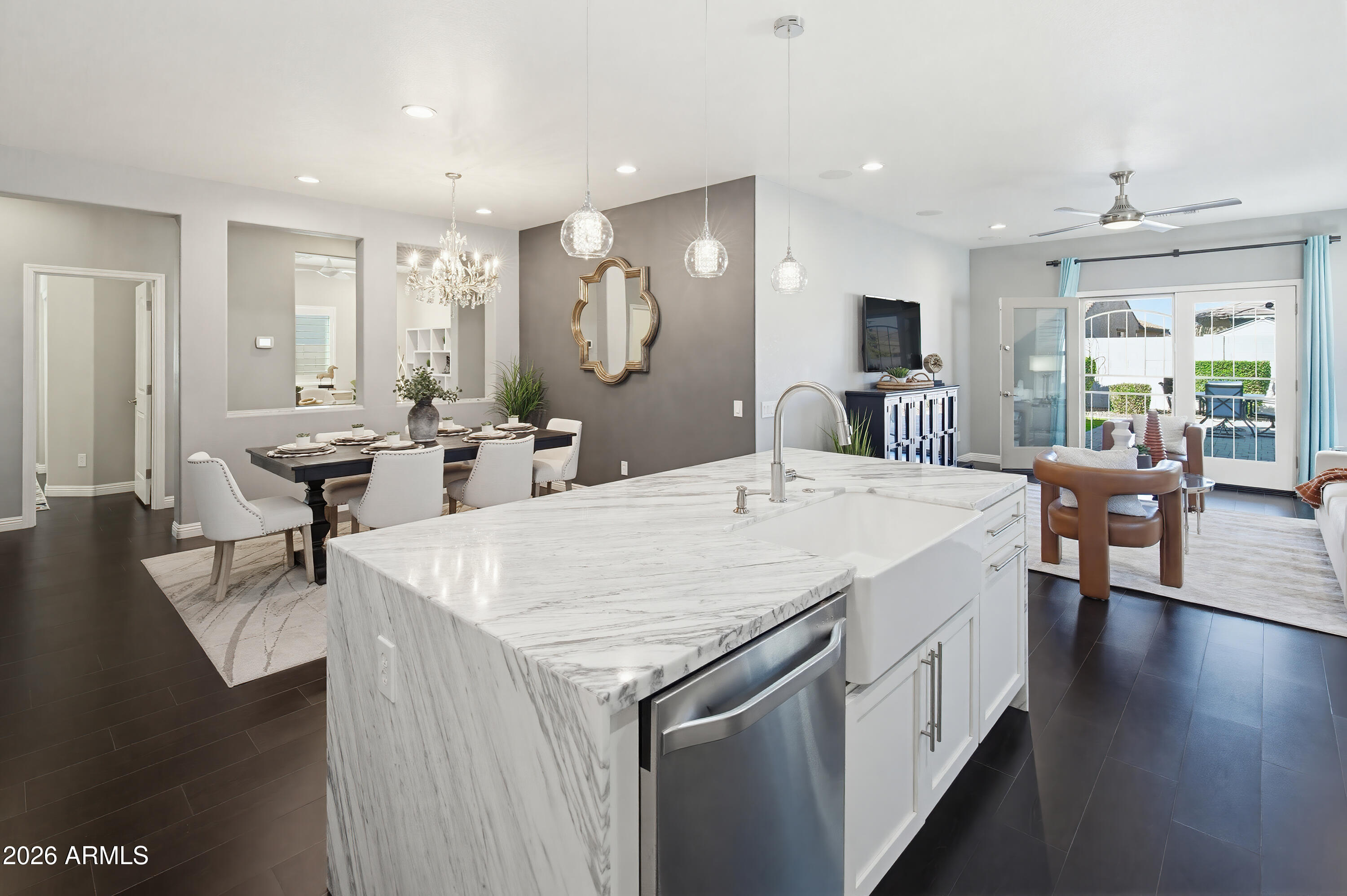 10772 West Yearling Road Peoria, AZ 85383 - Photo 11 of 39 a view of living room filled with furniture and wooden floor