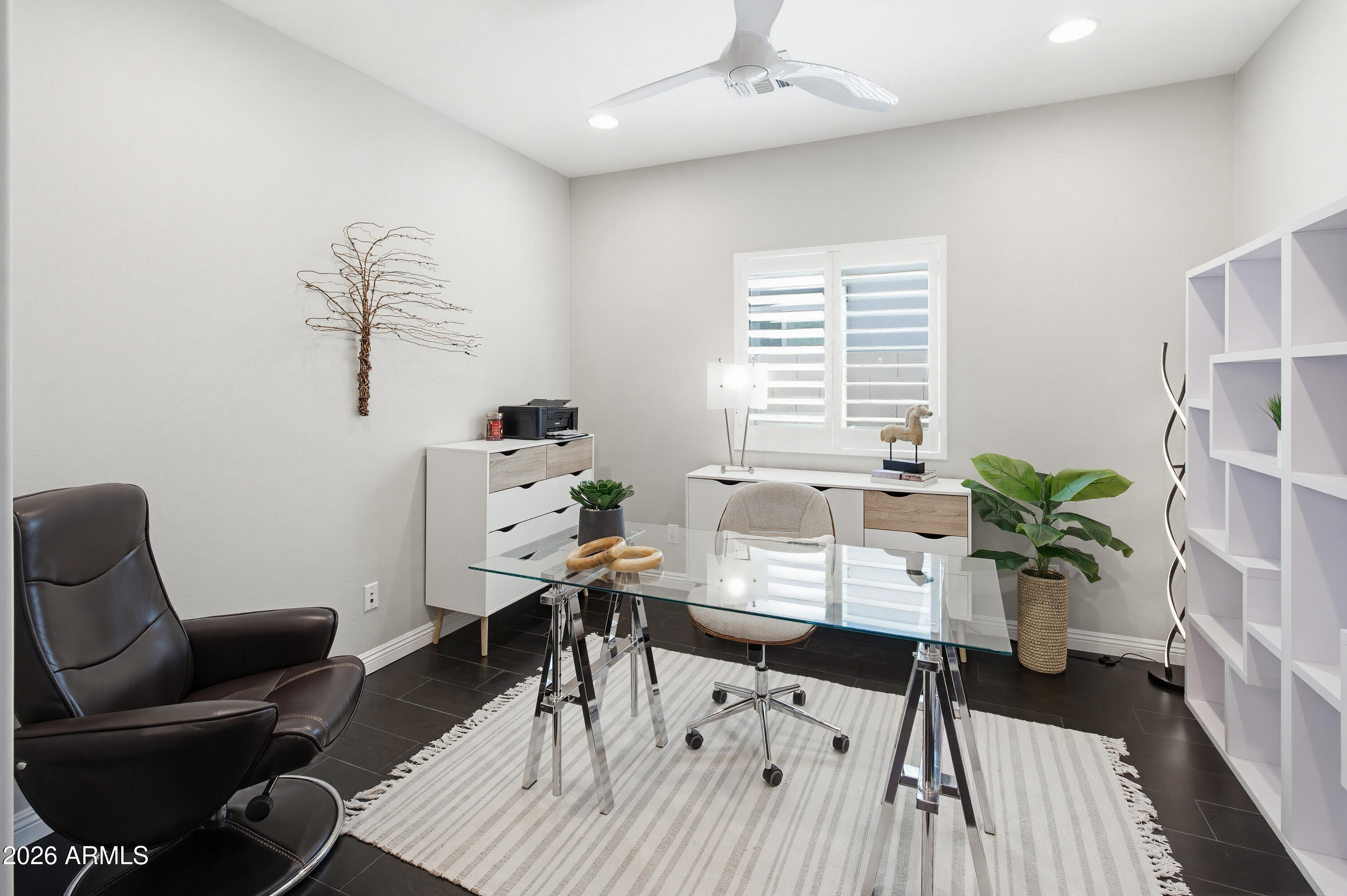 10772 West Yearling Road Peoria, AZ 85383 - Photo 20 of 39 a work room with furniture and wooden floor